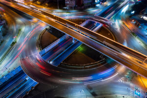 Aerial view of car traffic transportation above circle roundabou